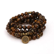 Bracelet mala il de tigre avec charm Lotus / Om / Bouddha | Bracelets | pierre naturelle bijoux
