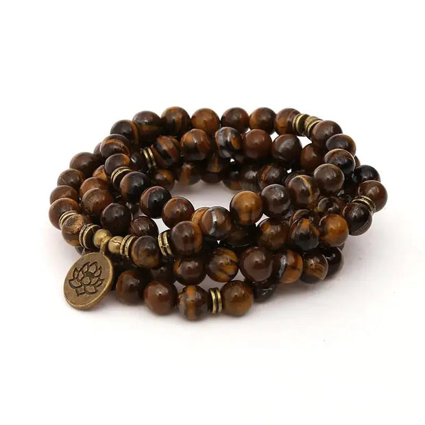 Bracelet mala il de tigre avec charm Lotus / Om / Bouddha | Bracelets | pierre naturelle bijoux